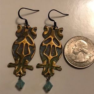 Artistic owl silhouette brass earrings